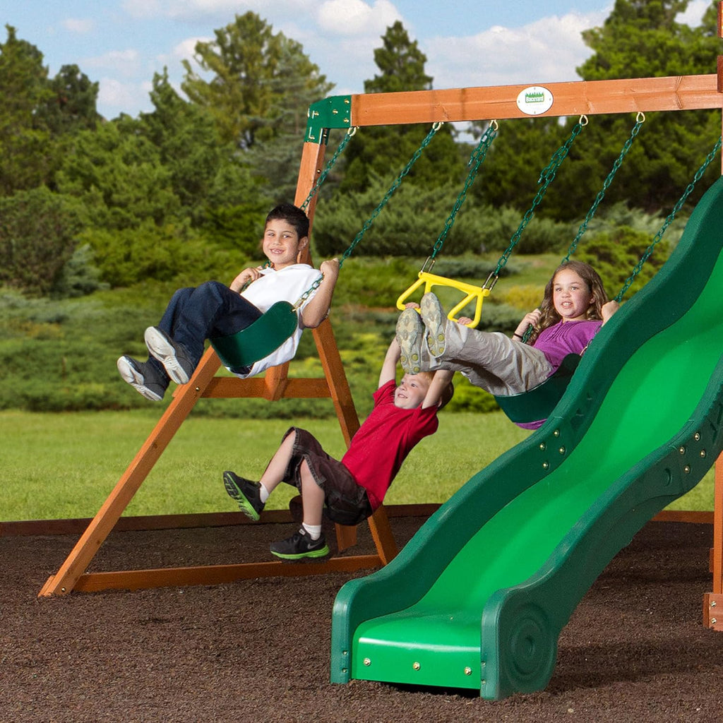 Backyard Discovery Shenandoah All Cedar Wooden Playset Swing Set with 2 Belt Swings, Trapeze Bar, 10 ft Wave Slide, Covered Upper and Lower Playhouse, Play Kitchen, Rock Wall, Outdoor Bench