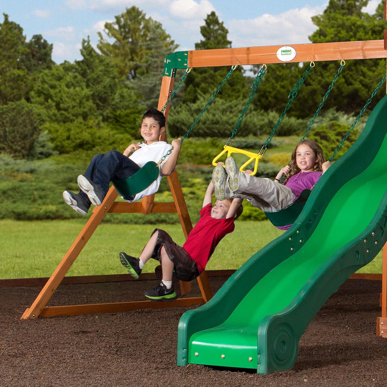 Backyard Discovery Shenandoah All Cedar Wooden Playset Swing Set with 2 Belt Swings, Trapeze Bar, 10 ft Wave Slide, Covered Upper and Lower Playhouse, Play Kitchen, Rock Wall, Outdoor Bench