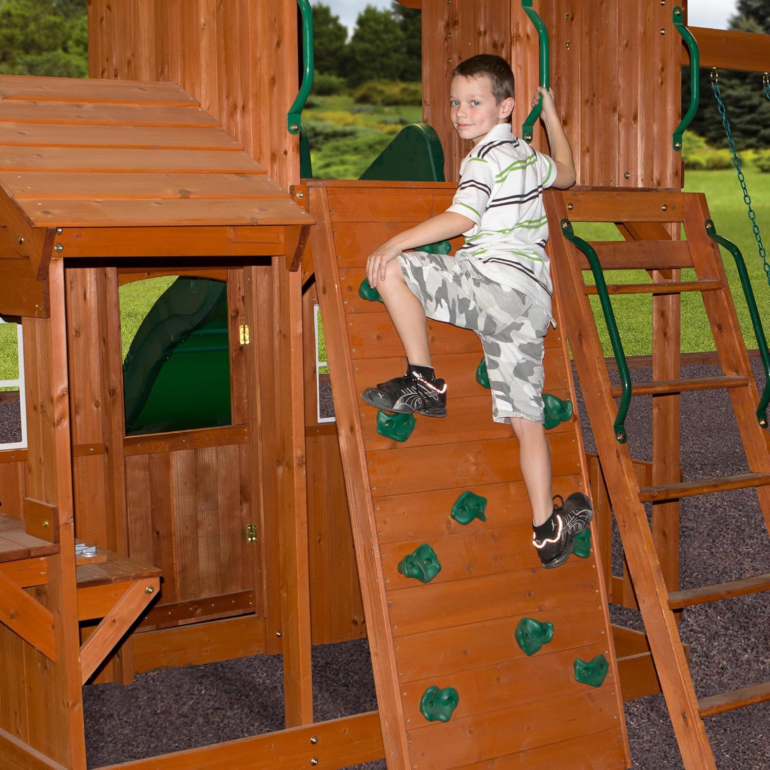 Backyard Discovery Shenandoah All Cedar Wooden Playset Swing Set with 2 Belt Swings, Trapeze Bar, 10 ft Wave Slide, Covered Upper and Lower Playhouse, Play Kitchen, Rock Wall, Outdoor Bench