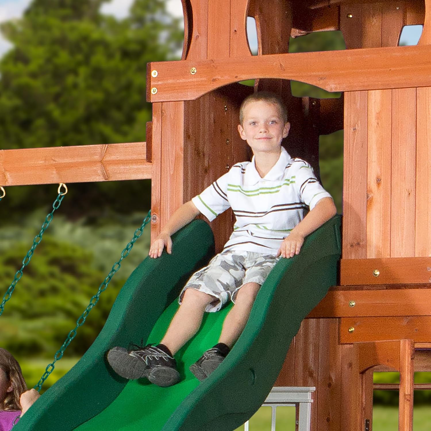 Backyard Discovery Shenandoah All Cedar Wooden Playset Swing Set with 2 Belt Swings, Trapeze Bar, 10 ft Wave Slide, Covered Upper and Lower Playhouse, Play Kitchen, Rock Wall, Outdoor Bench
